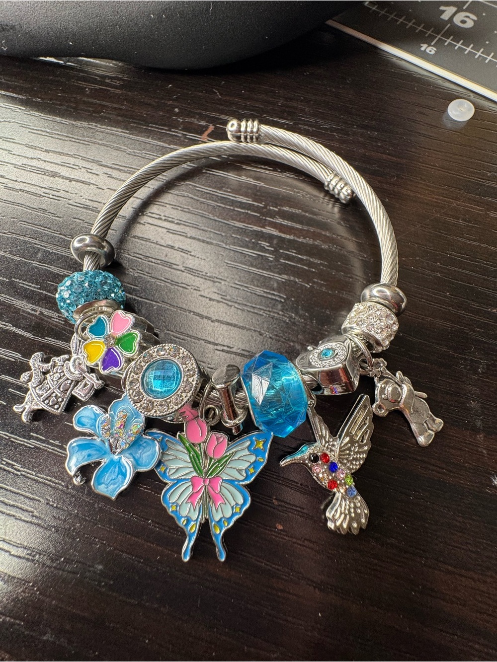 Silver-Tone Charm Bracelet with Blue and Multicolor Accents
